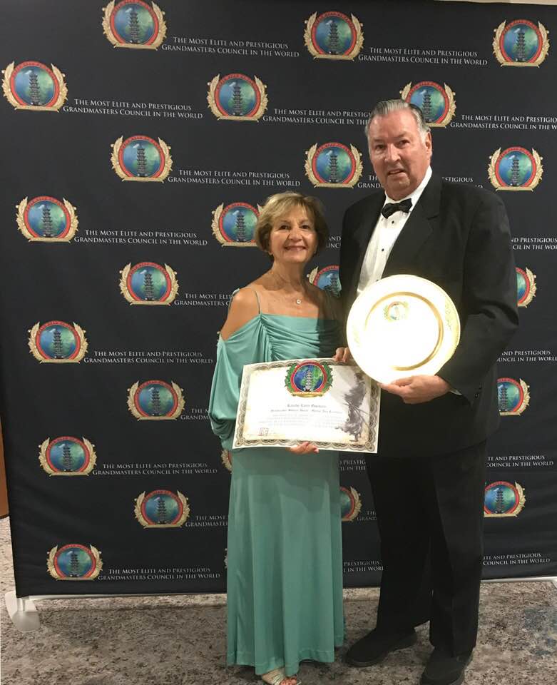 Kancho Larry Giordano with his wife, Eileen displaying the Grandmaster Shogun Award received in Orlando.